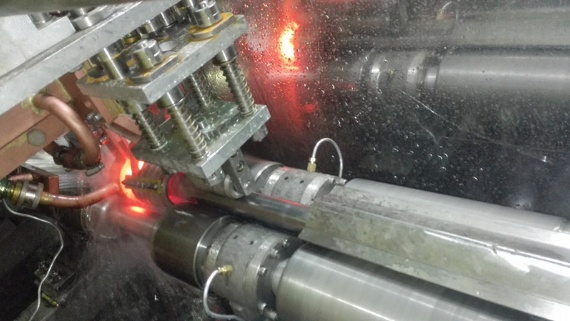 Collision rod induction heating production line