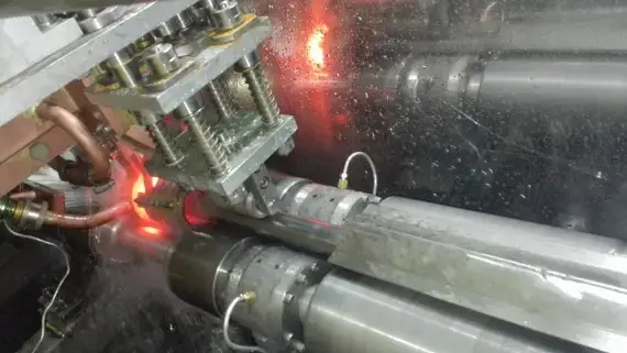 Collision rod induction heating production line